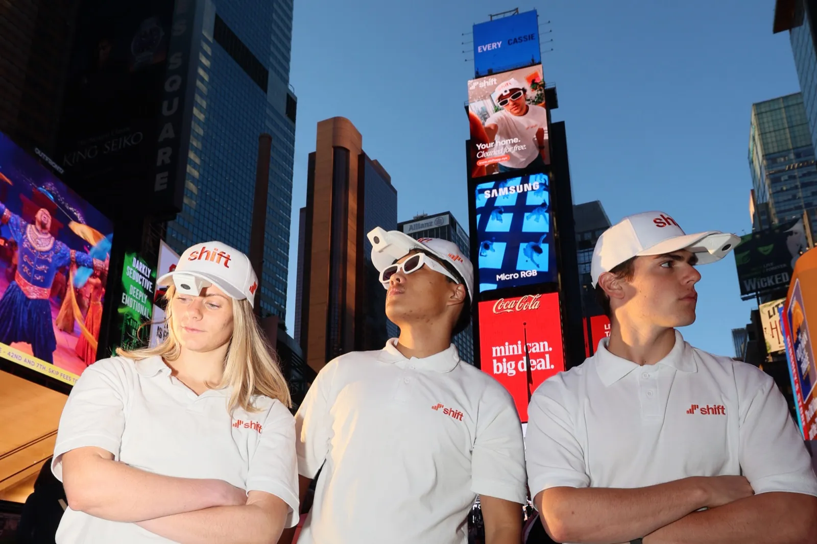 Shift operators wearing recording headgear in Times Square